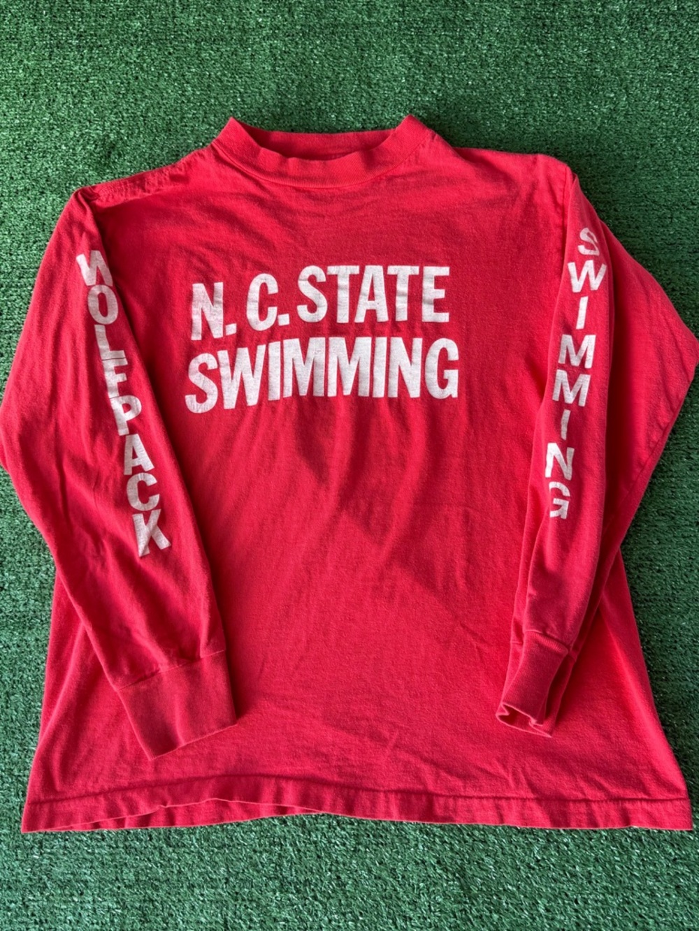 Vintage long sleeve NC State “wolf pack” swimming shirt double sided.
